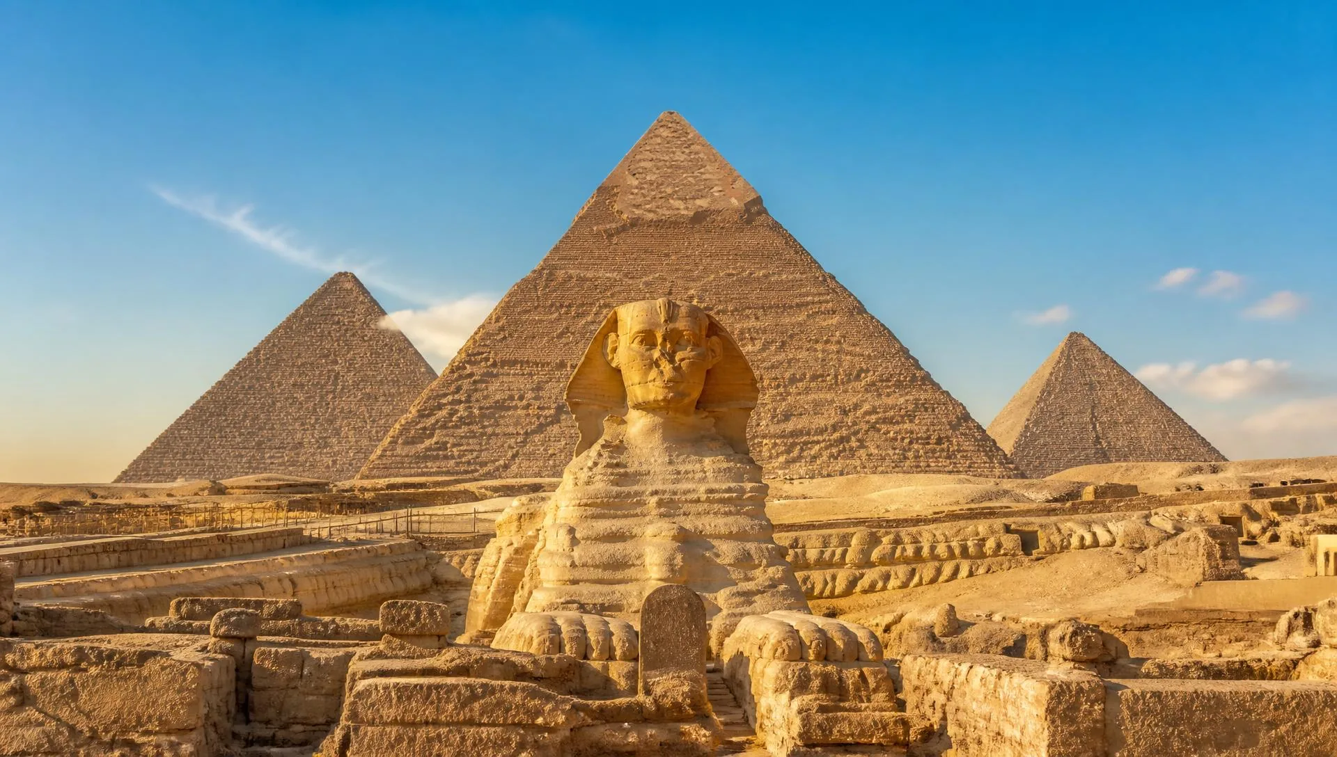 Pyramids of Giza and the Great Sphinx at sunset